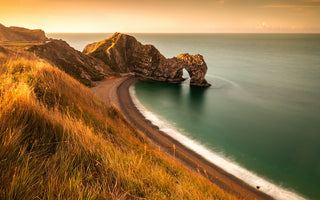 a long beach captured at sunset 