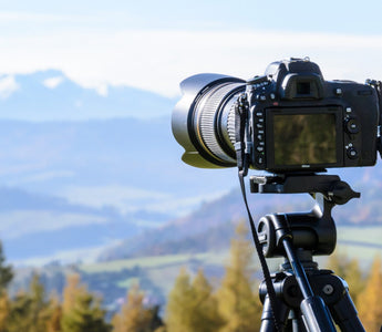 A DSLR pointed towards the view, to capture a timelapse video